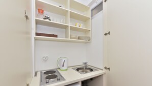 Family Apartment, Multiple Beds, Garden View | Private kitchenette | Coffee/tea maker, fridge, stovetop, electric kettle - Apartment Filip (Zadar)