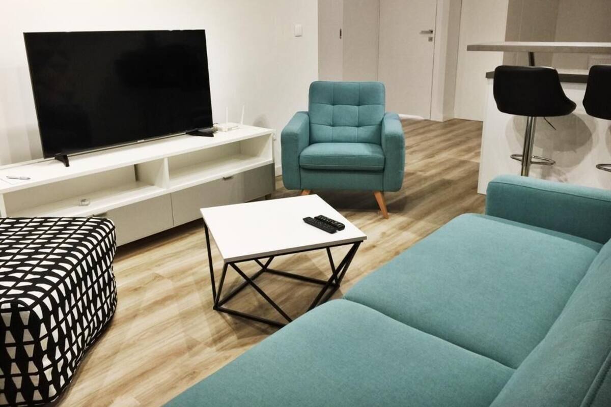 Business Apartment, 1 Bedroom | Living room | LCD TV