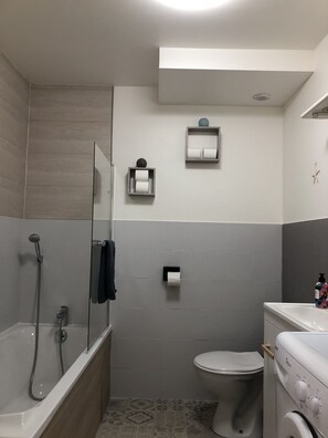 Hair dryer, towels, soap, toilet paper