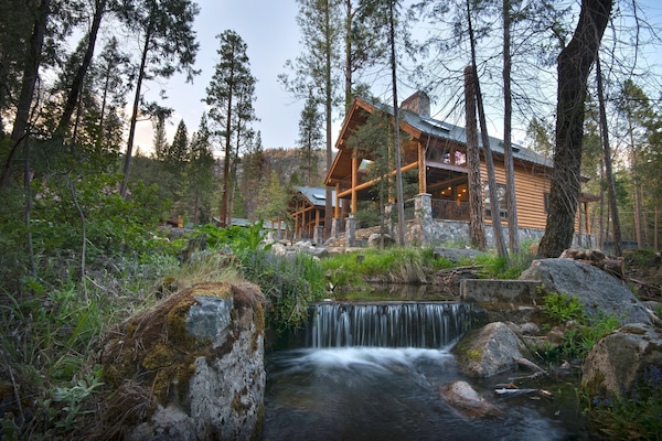 In front of Rustic Retreat
