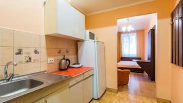 Apartment, 1 Double Bed with Sofa bed | Private kitchen | Full-size fridge, microwave, electric kettle, cookware/dishes/utensils