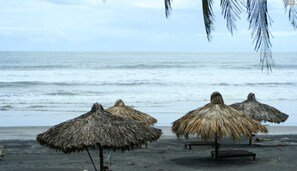 On the beach, black sand - Tortuga Village (La Herradura)