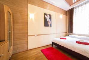 Departamento | 1 habitación, tabla de planchar con plancha, wifi gratis y ropa de cama 