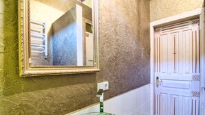 Apartment, 1 Bedroom (Valovaya St. 21a) | Bathroom | Shower, free toiletries, hair dryer, slippers - 1 Bedroom Apartment Valova 21a (Lviv)