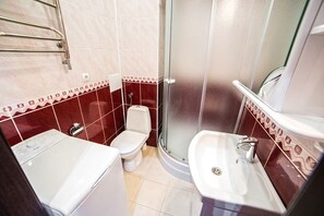 Apartment, City View | Bathroom | Shower, free toiletries, hair dryer, slippers - Apartment Mitskevicha 5a (Lviv)