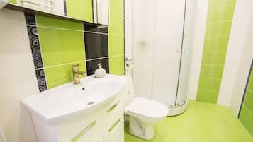 Apartment, Non Smoking | Bathroom | Shower, free toiletries, hair dryer, slippers