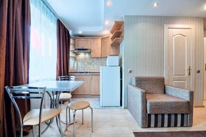 Apartment, Non Smoking | Private kitchen | Fridge, microwave, stovetop, electric kettle - Apartment Svobody 6-8a (Lviv)