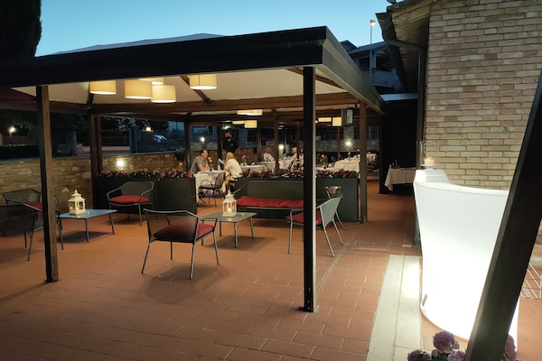 Breakfast, lunch, dinner served; local cuisine