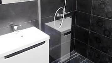 Apartment | Bathroom | Shower, free toiletries, hair dryer, slippers
