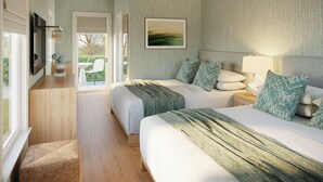 A hotel room with two beds, a large window, a flat-screen TV, and a painting on the wall. -  Shore Haven Inn (Falmouth)
