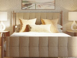 A bedroom with a large bed, two bedside tables, and a painting on the wall.