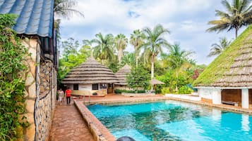 Outdoor pool, pool umbrellas, sun loungers