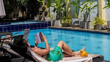 Outdoor pool, sun loungers