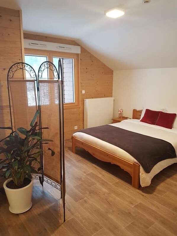 Family Room | Desk, blackout curtains, soundproofing, iron/ironing board