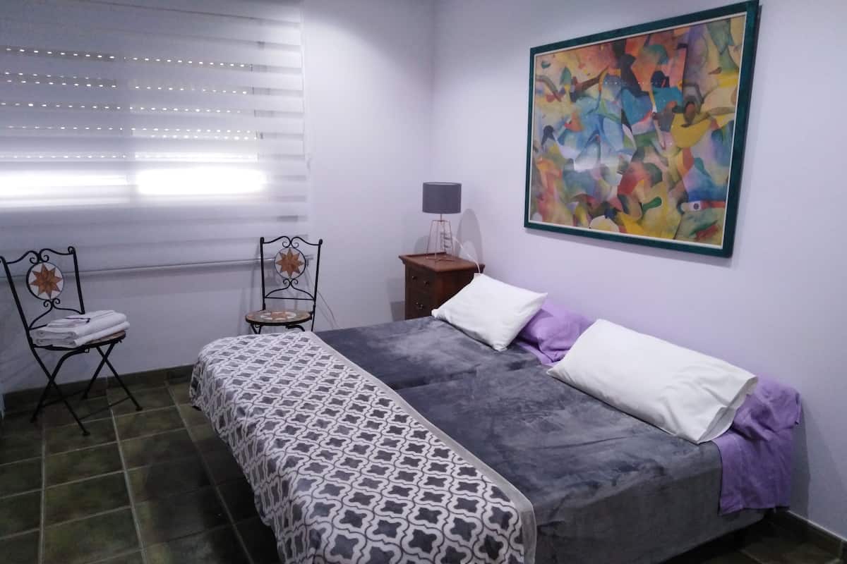 Blackout curtains, soundproofing, free WiFi, bed sheets