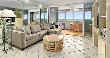 Beautiful 2 bedroom oceanfront condo with outdoor pool and WiFi access located uptown and just steps to the beach!