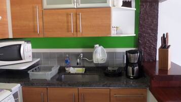 Fridge, microwave, coffee/tea maker, blender