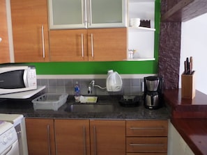 Fridge, microwave, coffee/tea maker, blender