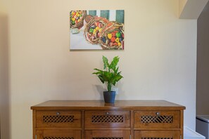 A wooden cabinet with drawers and a potted plant on top. - Villa Anita | 5 Bedrooms | Private | Vilamoura (Vilamoura)