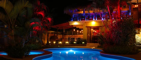 Outdoor pool, open 9:00 AM to 7:00 PM, pool umbrellas, pool loungers