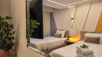Deluxe Double Room | Minibar, laptop workspace, blackout drapes, free WiFi