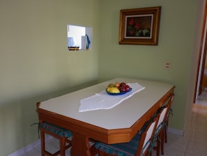 Dining - Beach Cove Apartment in Closed Condominium with Balcony and Garden (Guaruja)