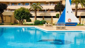 A swimming pool with a lifebuoy and a sailboat decoration. - Calpe: apartment/ flat - CALPE (Calpe)