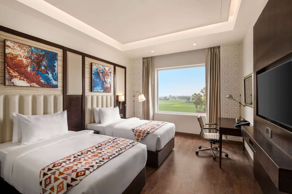 Pillow-top beds, minibar, in-room safe, desk