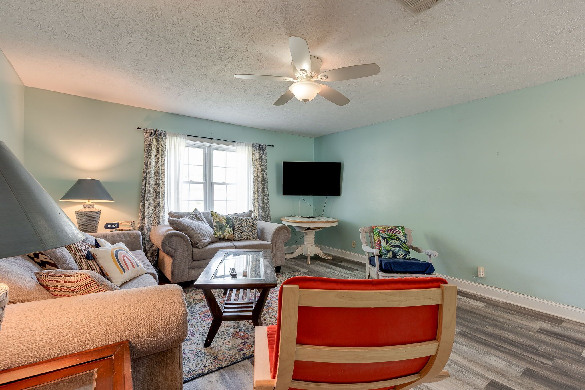 Stroll to the beach on this quiet street!