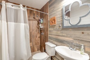 Combined shower/tub, hair dryer, towels, soap