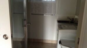 Hair dryer, towels, shampoo, toilet paper