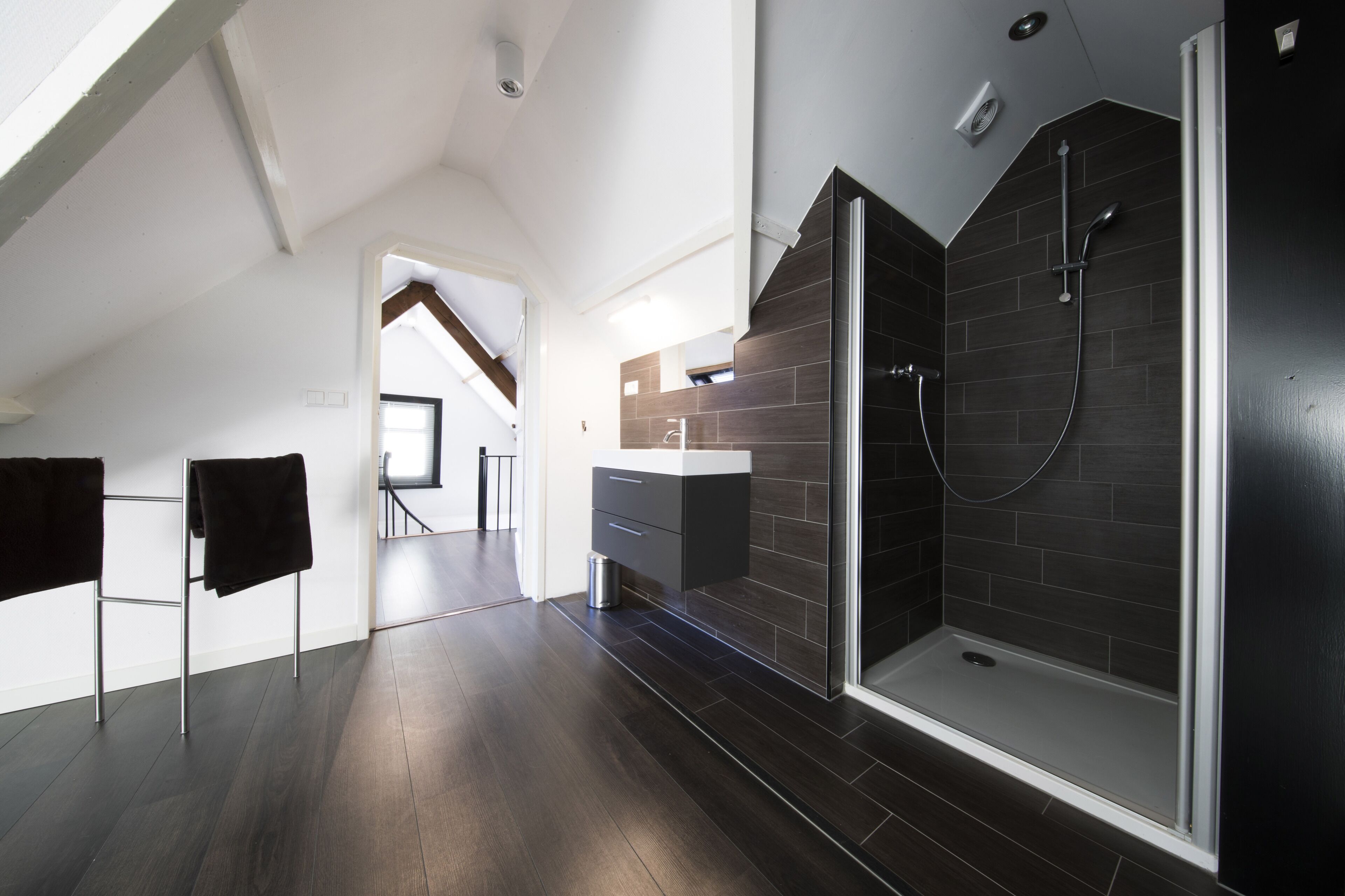 Shower, hair dryer, towels, toilet paper