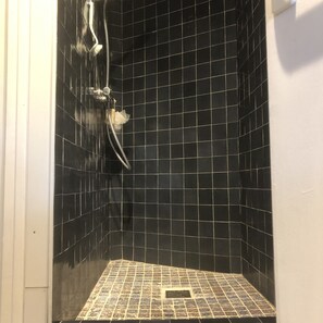 Bathtub, hair dryer, towels