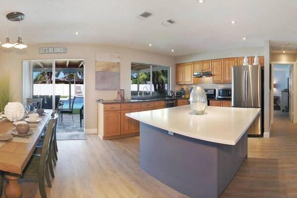 Fridge, microwave, oven, stovetop - Beautiful fully renovated home with stunning heated pool, walk to downtown (Cape Coral)