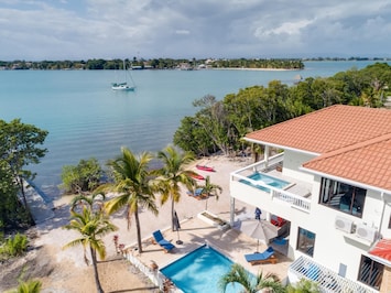 Property wide shot - Placencia Point across the water.