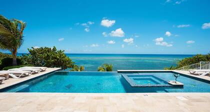Our Cayman Cottage: Spacious Family Beach House w/ Pool, Spa, Kayaks, + Arcade Room