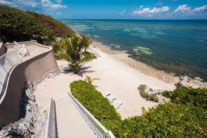 On the beach, sun-loungers, beach towels - Our Cayman Cottage: Spacious Family Beach House w/ Pool, Spa, Kayaks, + Arcade Room (Queens Highway)