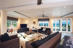 TV, video games, books, stereo - Our Cayman Cottage: Spacious Family Beach House w/ Pool, Spa, Kayaks, + Arcade Room (Queens Highway)