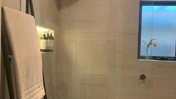 Hair dryer, bathrobes, towels, shampoo