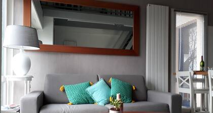 Spacious T2 duplex in a wooded residence 5 minutes from the beach and the center