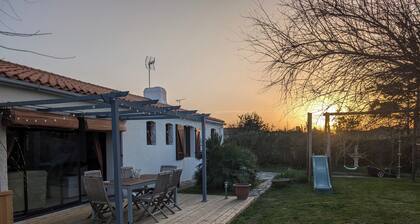 Warm, family home opening onto garden near sea, forest and marshes
