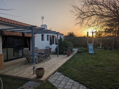 Warm, family home opening onto garden near sea, forest and marshes