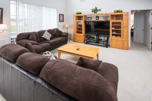 House, 6 Bedrooms | Living area | Flat-screen TV - Emerald Island Resort 2706 (Kissimmee)