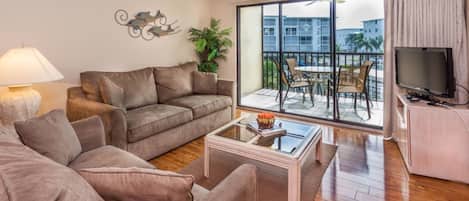 Condo, 2 Bedrooms | Living area | Flat-screen TV