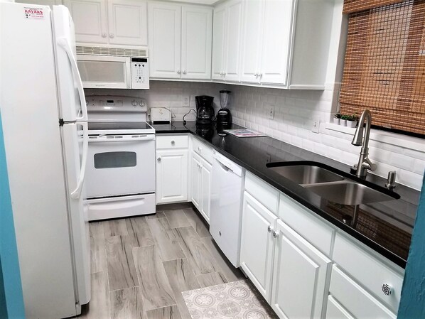 Condo, 2 Bedrooms | Private kitchen | Dishwasher, toaster, blender, cookware/dishes/utensils - Fort Myers Beach Area 7327 - 203 (Fort Myers Beach)