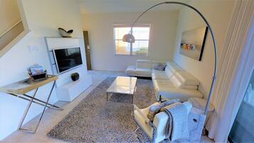 Townhome, 4 Bedrooms | Living area | Flat-screen TV