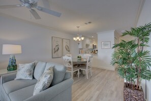 Condo, 2 Bedrooms | Living area | TV, toys - Anna Maria Island 1301 2B (Bradenton Beach)