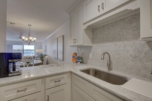 Condo, 2 Bedrooms | Private kitchen | Fridge, microwave, oven, stovetop