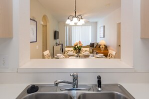 Condo, 3 Bedrooms | Private kitchen | Dishwasher, cookware/dishes/utensils - Windsor Palms 2301 - 203 (Kissimmee)