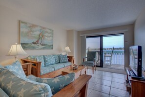 Condo, 2 Bedrooms | Living area | Flat-screen TV, toys - Anna Maria Island 1301 6B (Bradenton Beach)
